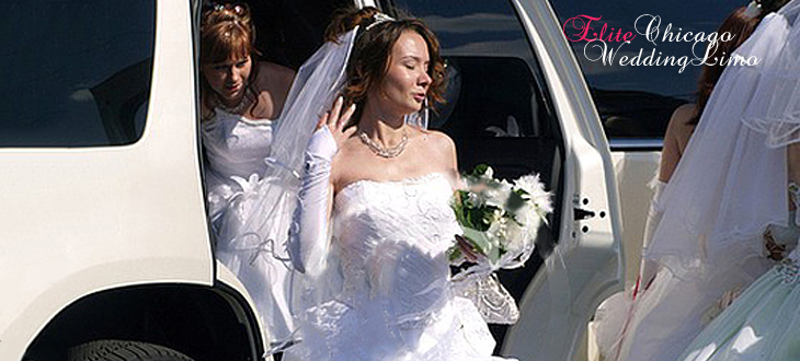 Bride in front of a Wedding Hummer H2 limousine
